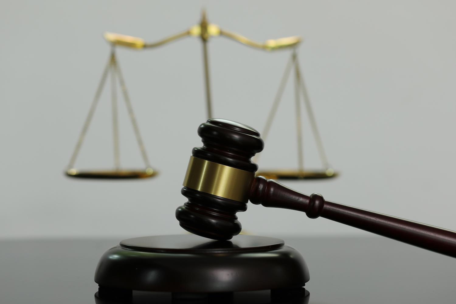 Close-up judge's hammer, scales, business legal advisor
